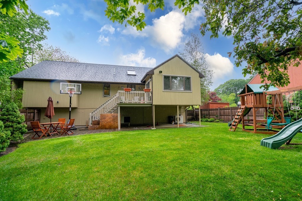 3 Macone Circle Stoneham, MA 02180 - Photo 4 of 26 a view of a house with a yard porch and sitting area