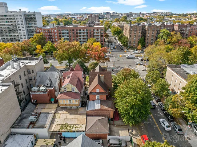 a view of a street with cars