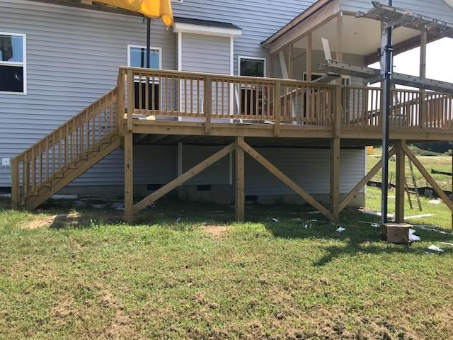 4416 Beckel Road Willow Spring, NC 27592 - Photo 8 of 11 Nice 14x12 deck with plenty of storage underneath deck
