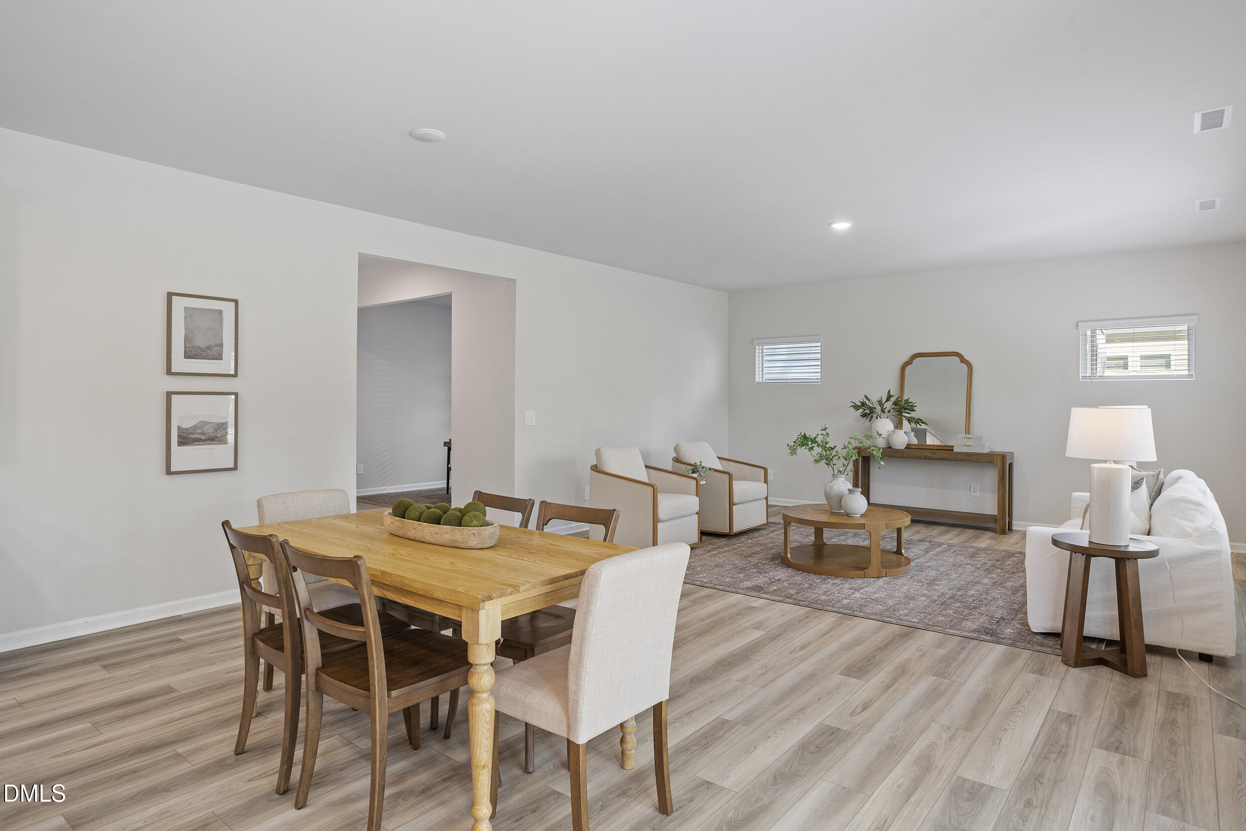 1105 Umstead Grv Way Durham, NC 27712 - Photo 21 of 38 a view of a dining room with furniture