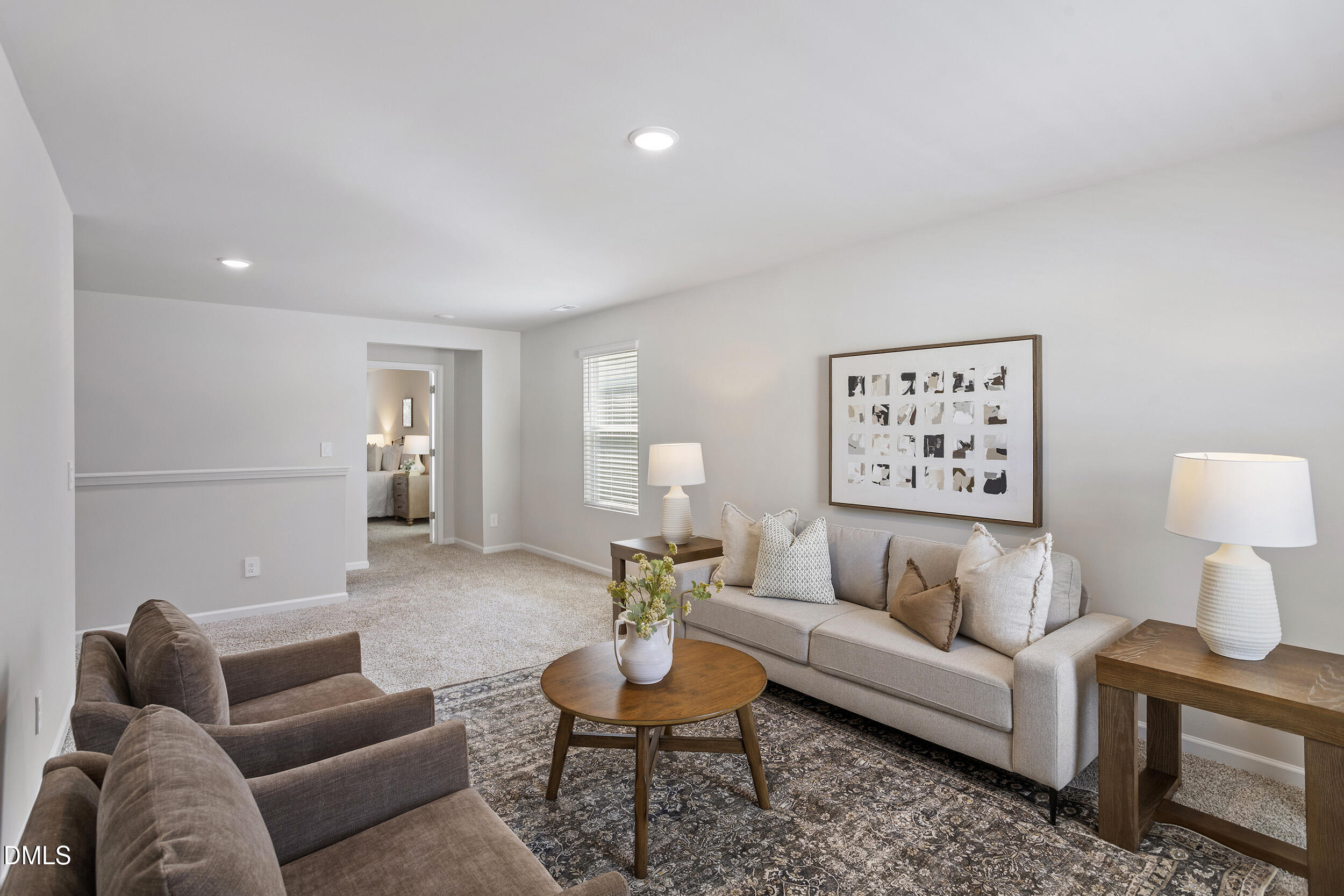 1105 Umstead Grv Way Durham, NC 27712 - Photo 23 of 38 a living room with furniture and a lamp