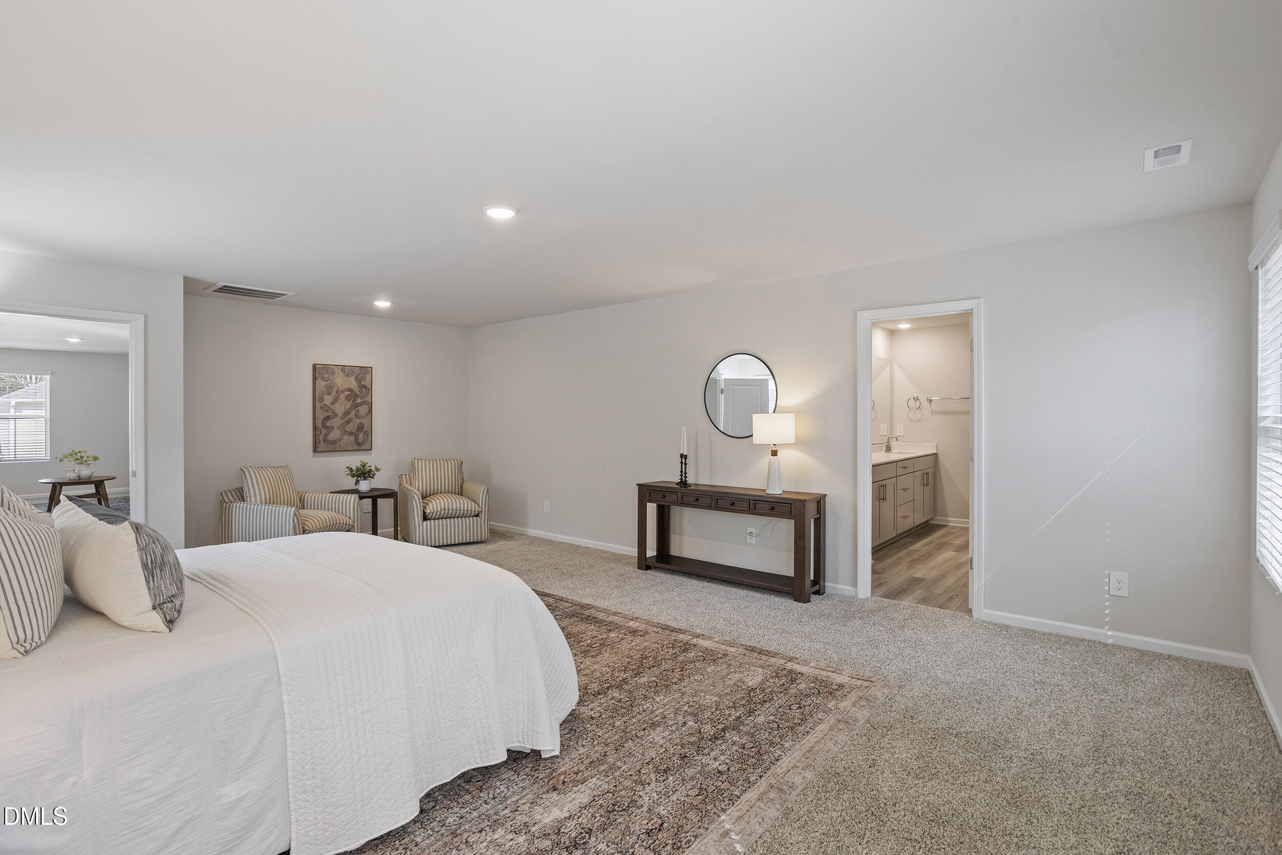 1105 Umstead Grv Way Durham, NC 27712 - Photo 25 of 38 a bedroom with a bed and a dresser