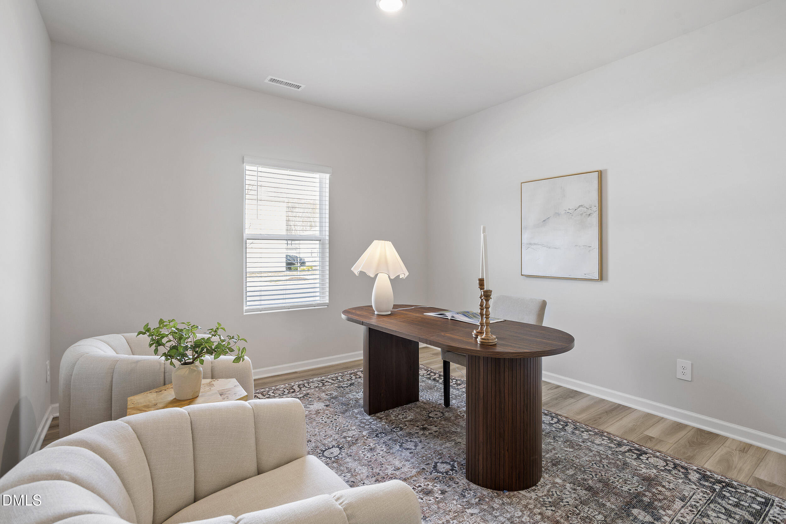 1105 Umstead Grv Way Durham, NC 27712 - Photo 6 of 38 a living room with furniture flowerpot and a window
