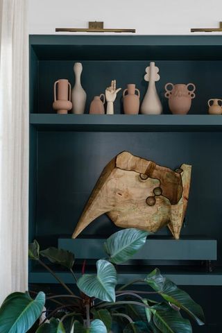 a en suite bathroom with a sink vanity and mirror