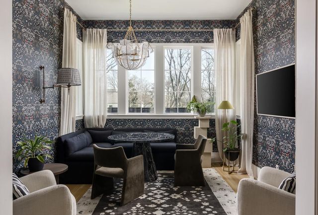a bathroom with a double vanity sink toilet mirror and bathtub