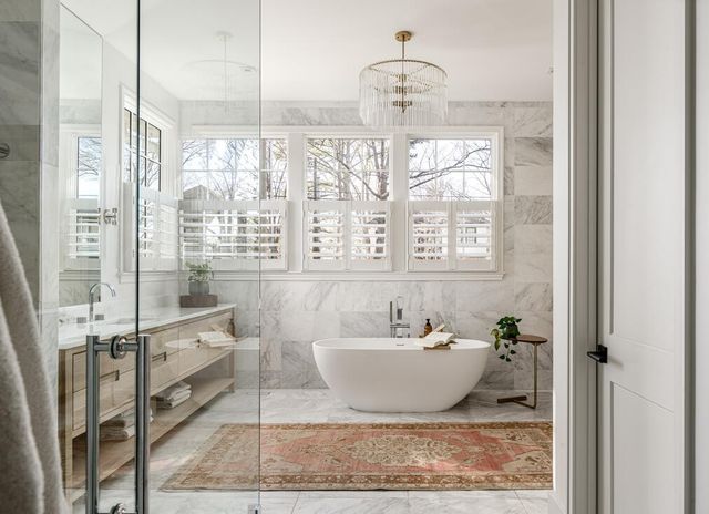a view of a kitchen with washing machine and a sink