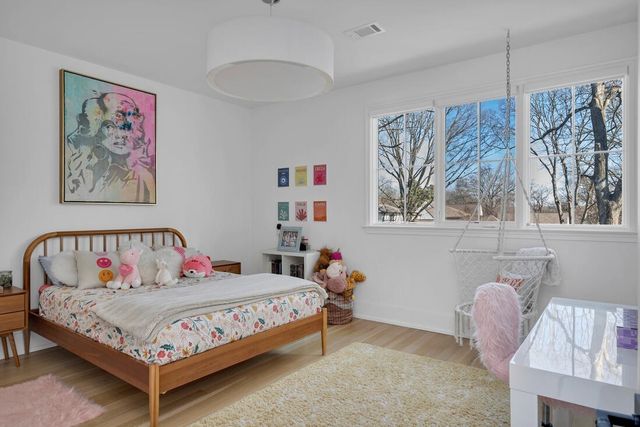 a view of a patio with couches and potted plants