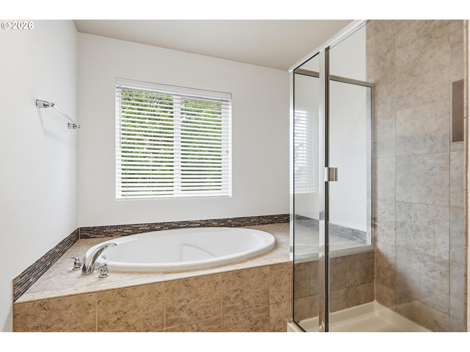 20881 Southwest Edgemont Street Beaverton, OR 97003 - Photo 14 of 39 a bathroom with a tub and a sink