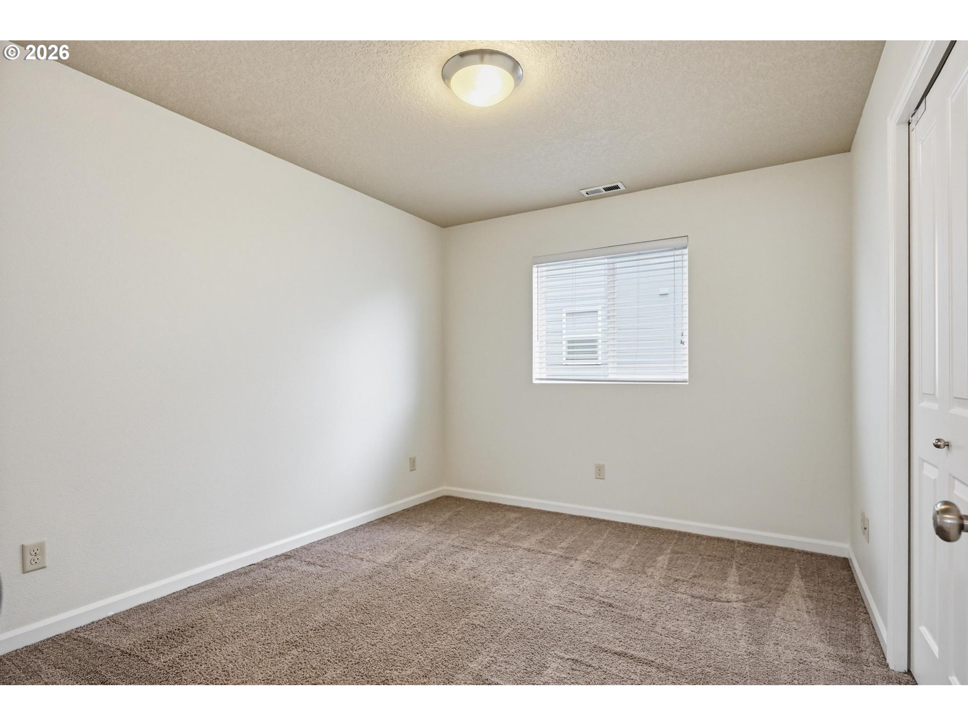 20881 Southwest Edgemont Street Beaverton, OR 97003 - Photo 27 of 39 a view of an empty room with a window