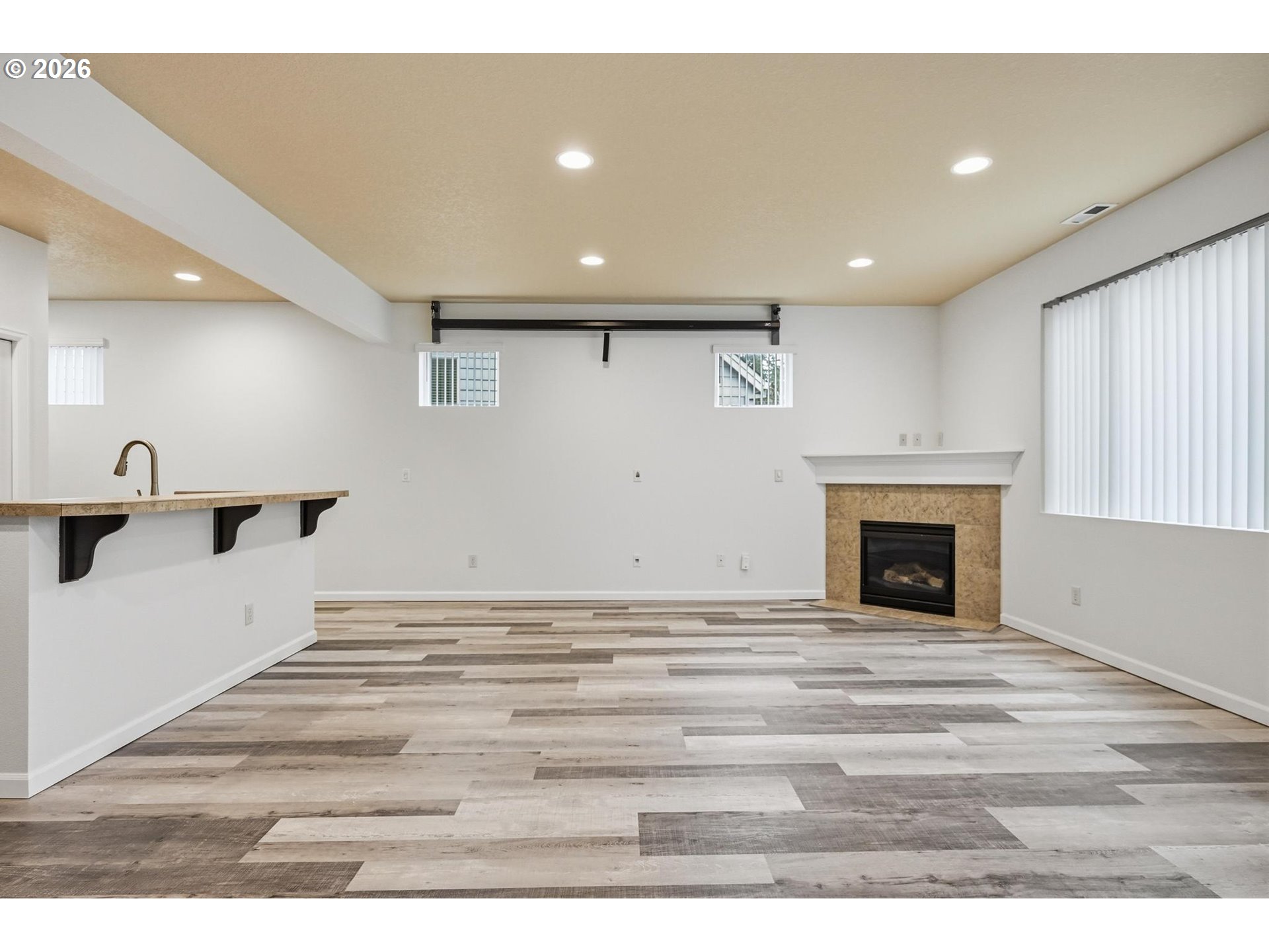 20881 Southwest Edgemont Street Beaverton, OR 97003 - Photo 10 of 39 a view of empty room with wooden floor