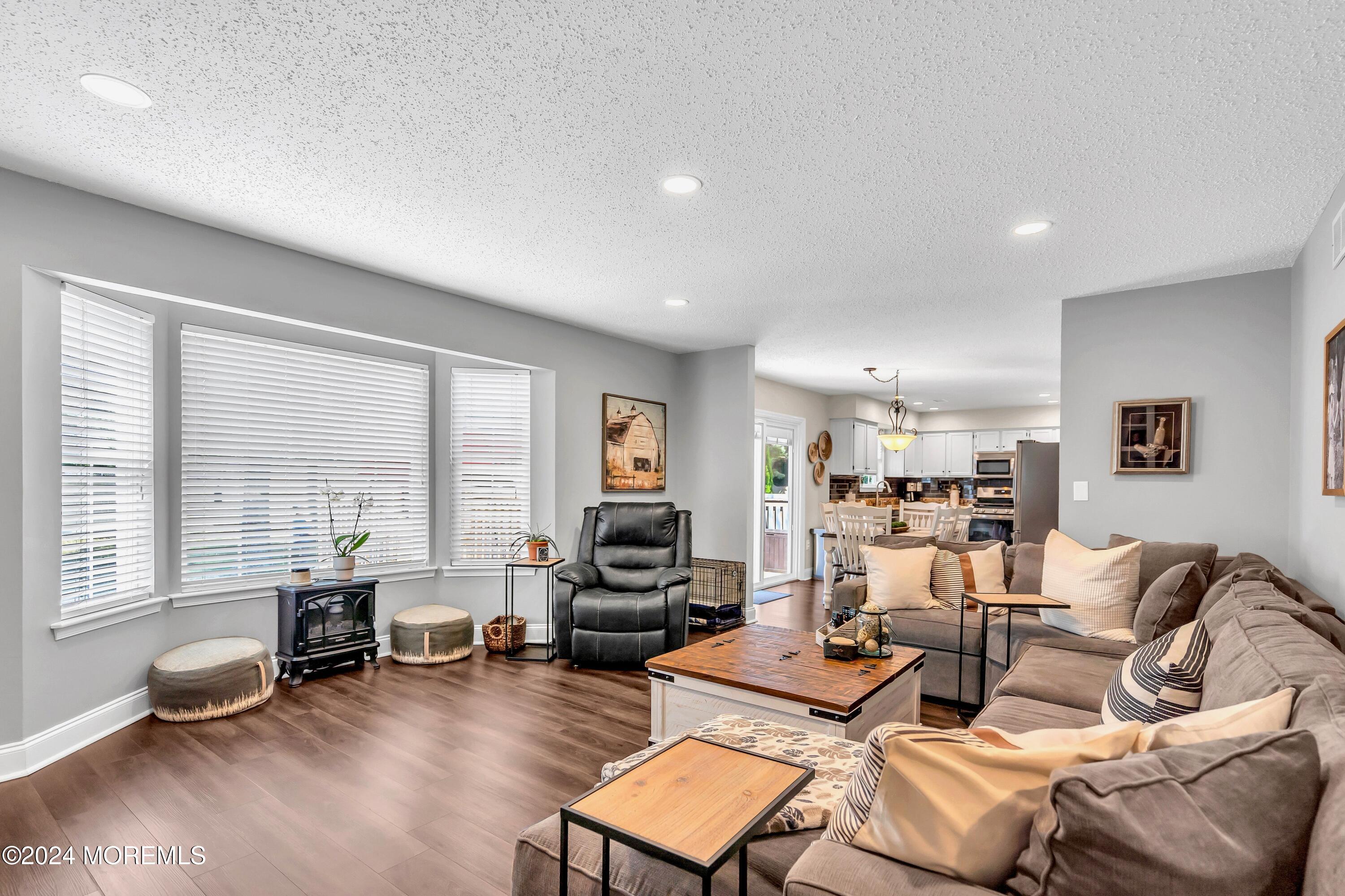 161 Old Orchard Road Toms River, NJ 08755 - Photo 12 of 32 a living room with furniture and a large window