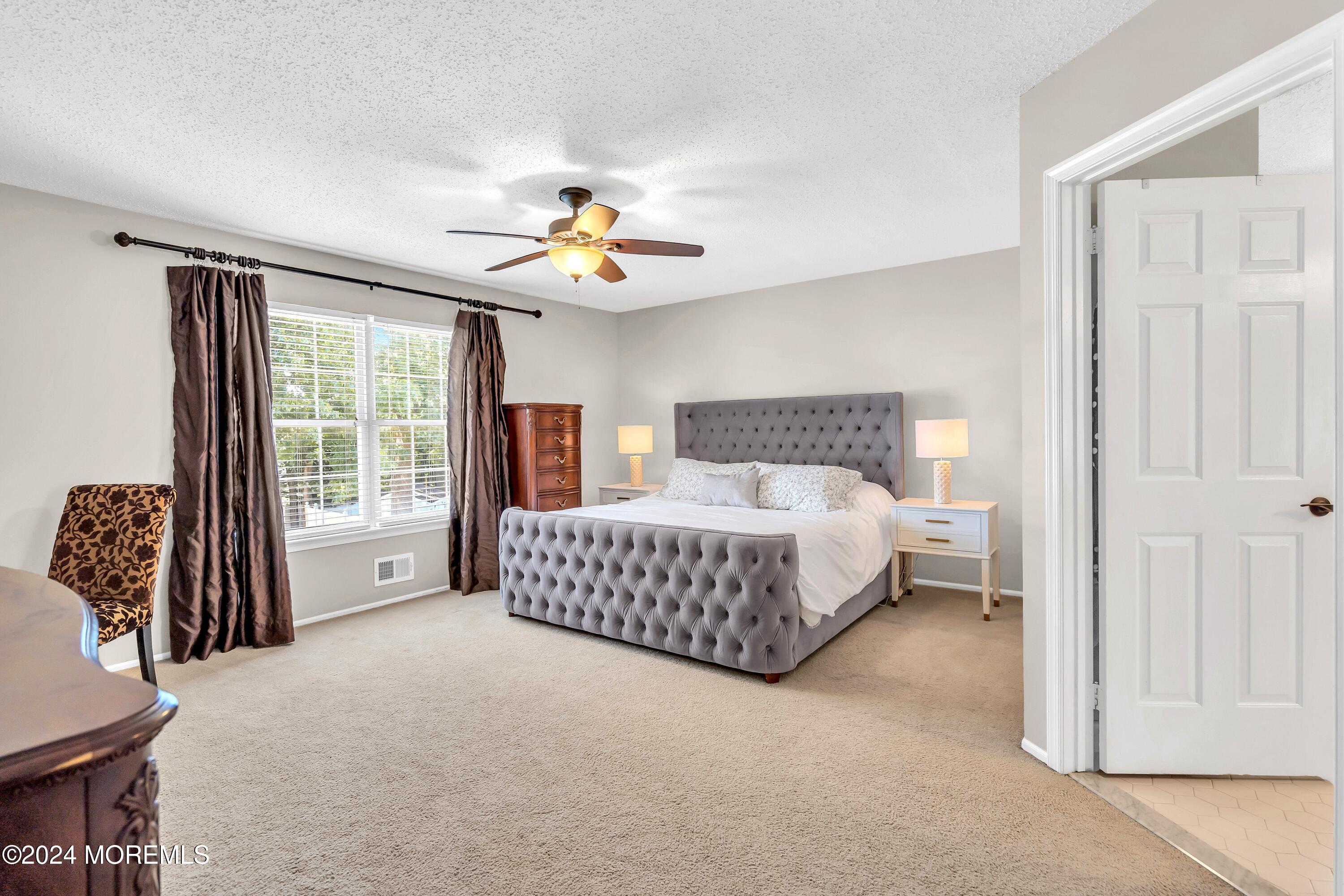 161 Old Orchard Road Toms River, NJ 08755 - Photo 17 of 32 a bedroom with a bed and a window