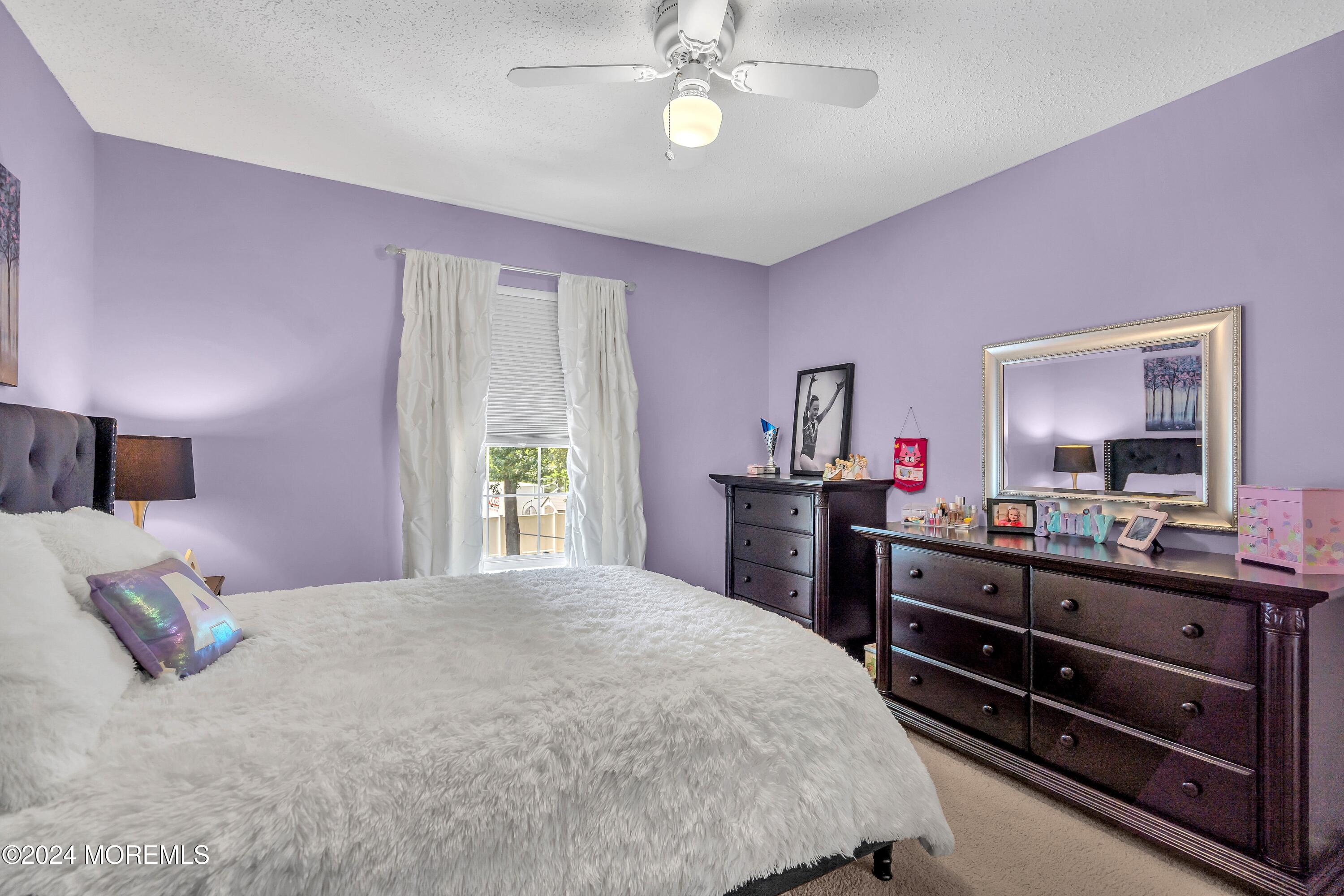 161 Old Orchard Road Toms River, NJ 08755 - Photo 23 of 32 a bedroom with a bed and a dresser in it