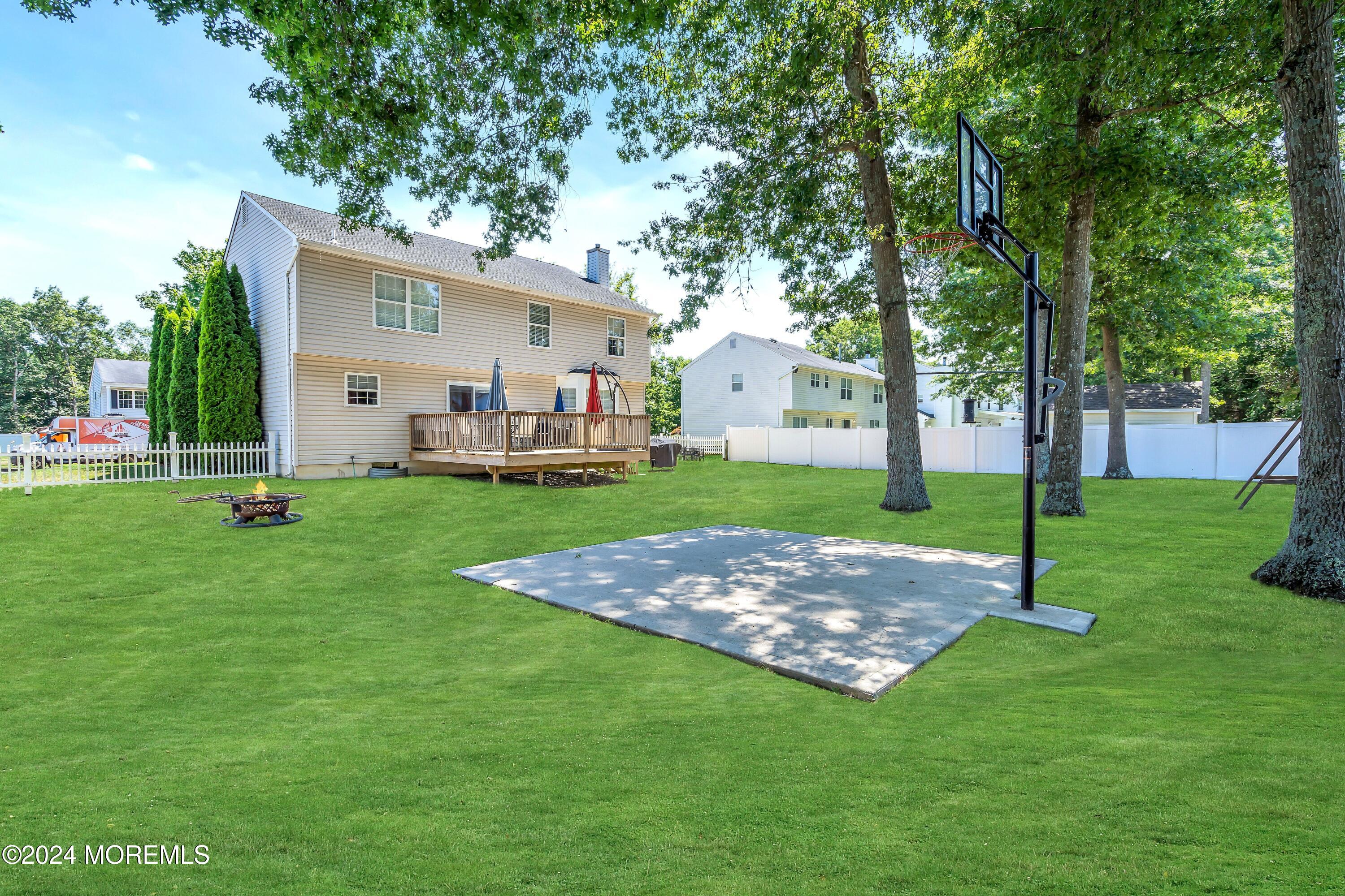 161 Old Orchard Road Toms River, NJ 08755 - Photo 29 of 32 a view of a backyard with a small cabin