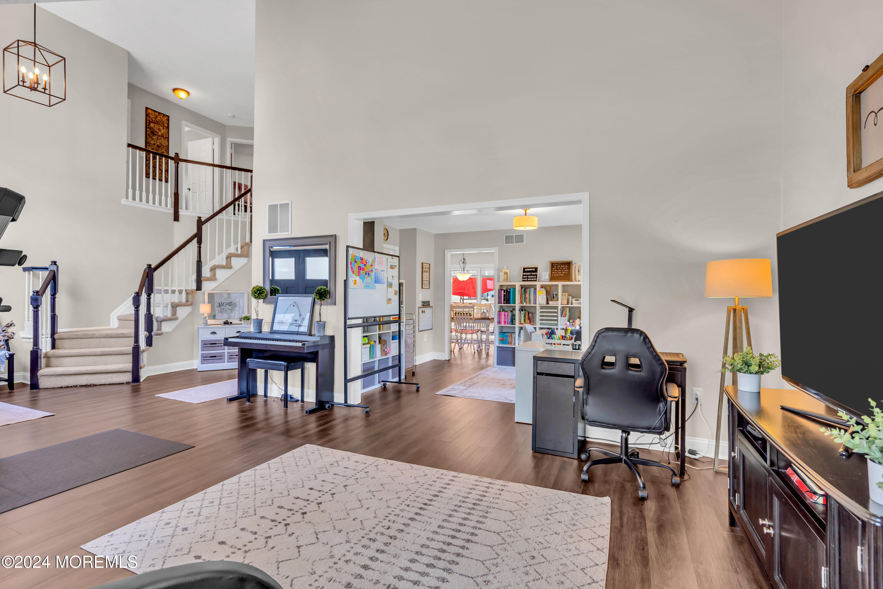 161 Old Orchard Road Toms River, NJ 08755 - Photo 4 of 32 a living room with furniture a piano and a flat screen tv