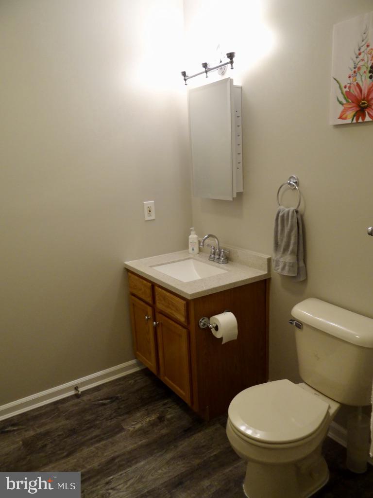 126 Green Street Mount Holly, NJ 08060 - Photo 16 of 41 a bathroom with a sink vanity and toilet