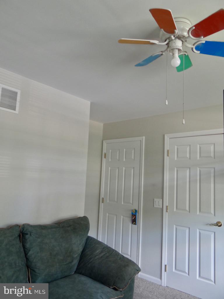 126 Green Street Mount Holly, NJ 08060 - Photo 20 of 41 a living room with furniture and a rug