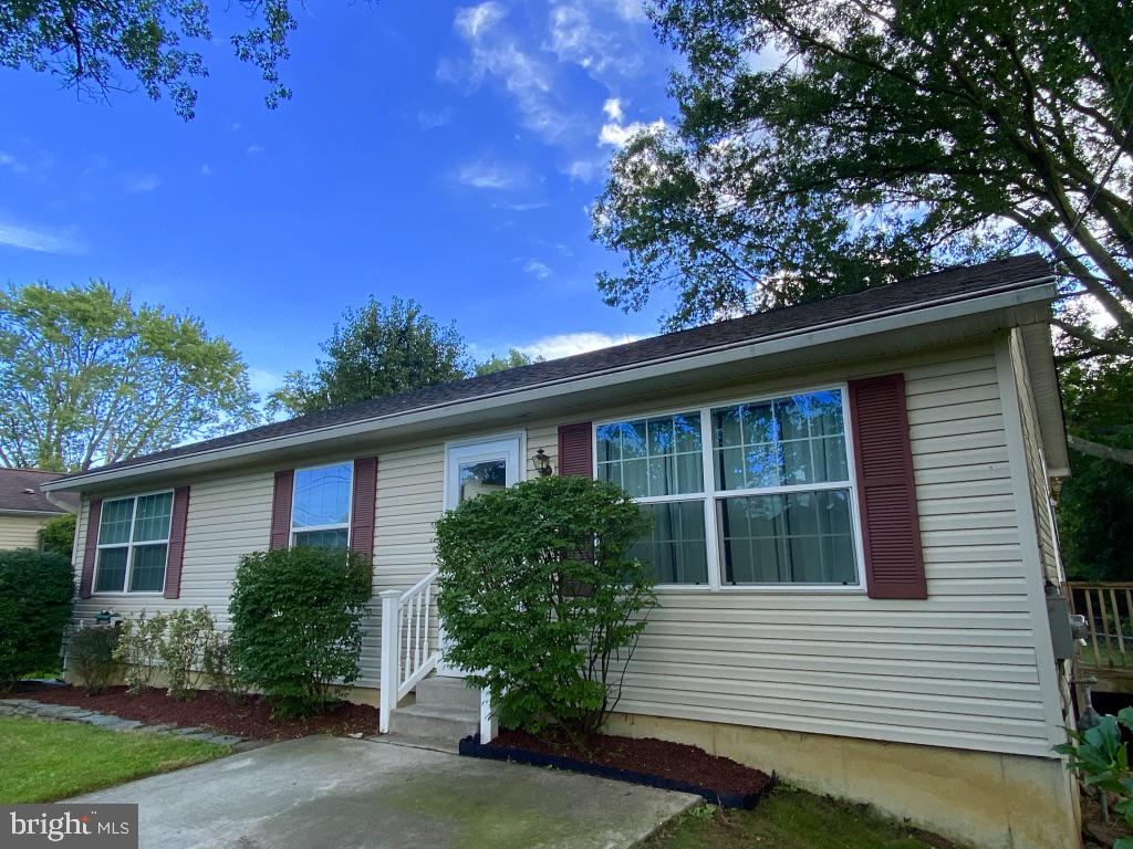 126 Green Street Mount Holly, NJ 08060 - Photo 3 of 41 a house with a tree in front of it