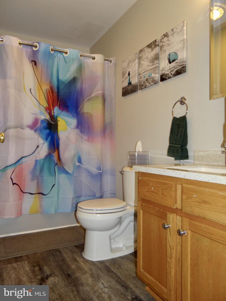 126 Green Street Mount Holly, NJ 08060 - Photo 24 of 41 a bathroom with a toilet and a sink