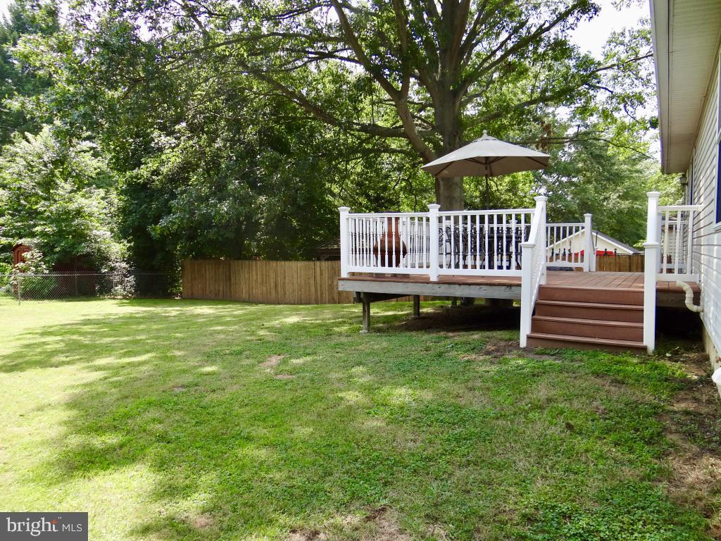 126 Green Street Mount Holly, NJ 08060 - Photo 37 of 41 a view of a deck with a small yard and a fence