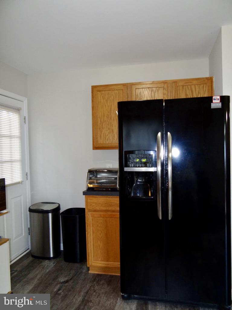 126 Green Street Mount Holly, NJ 08060 - Photo 10 of 41 a kitchen with stainless steel appliances kitchen island granite countertop a refrigerator a stove and a sink
