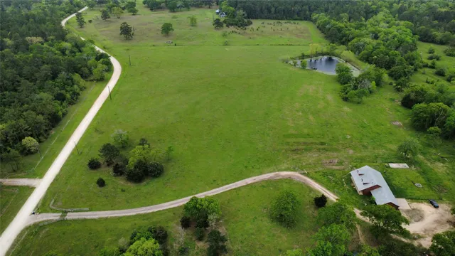 a view of a golf course with a lake view