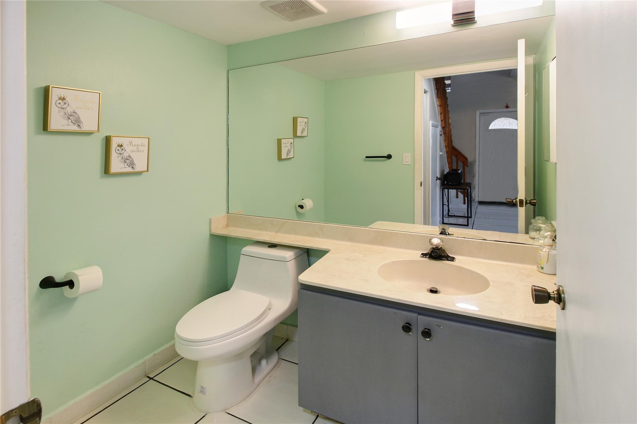 561 Racquet Club Road, Unit 23 Weston, FL 33326 - Photo 8 of 19 Half Bath located on first floor