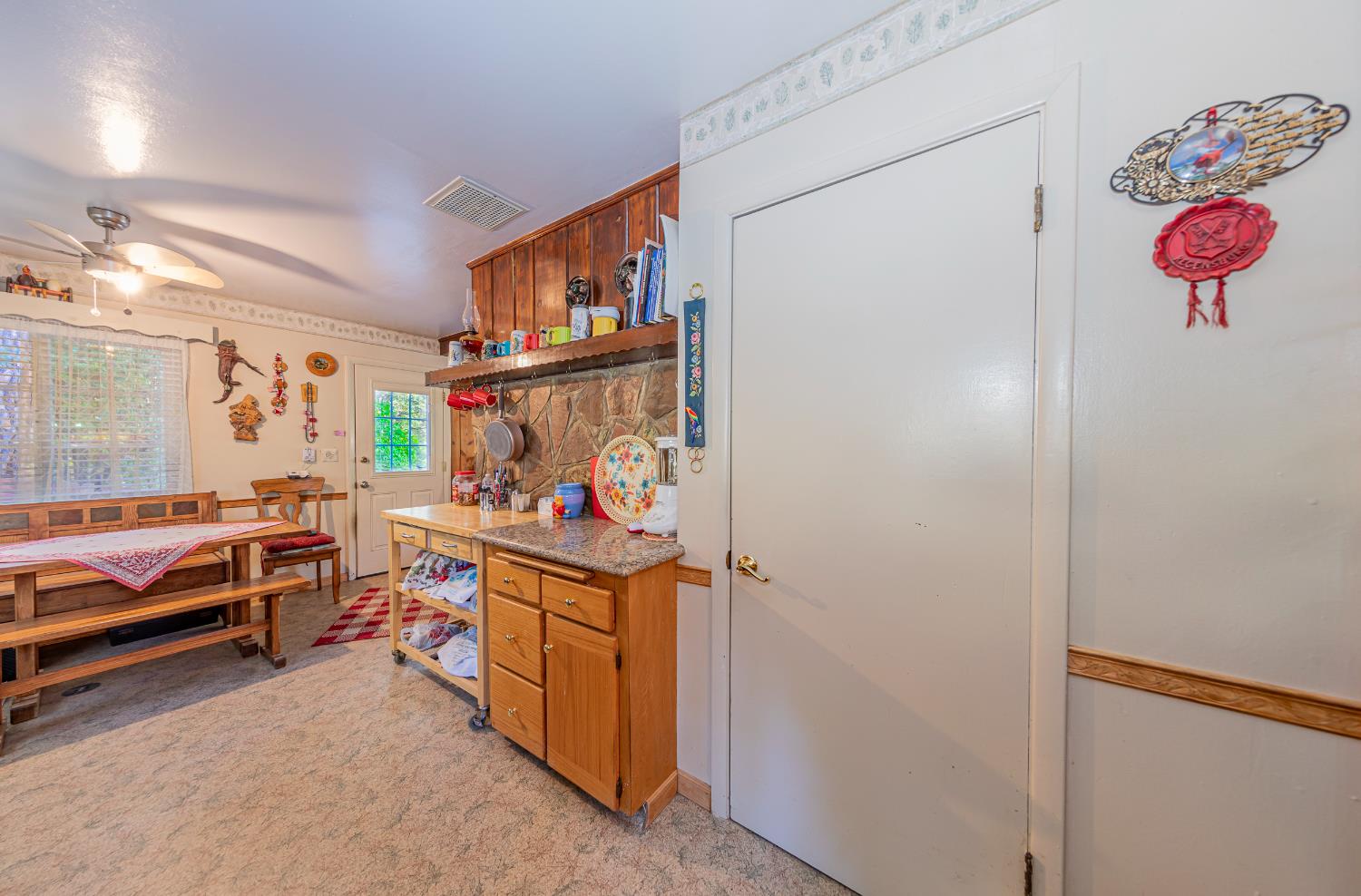 42585 Buckeye Road Oakhurst, CA 93644 - Photo 14 of 55 a room with storage and utility