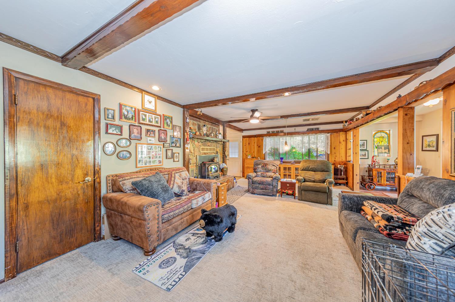 42585 Buckeye Road Oakhurst, CA 93644 - Photo 2 of 55 a living room with furniture and a large window