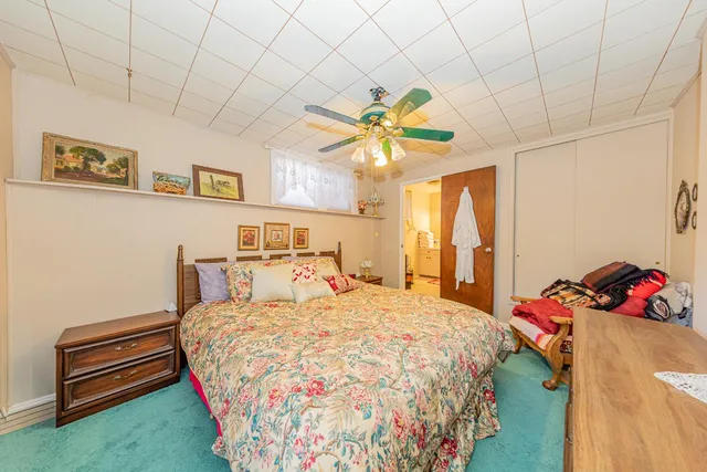 a balcony with furniture and wooden floor