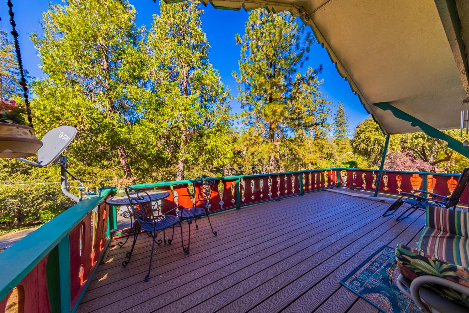 42585 Buckeye Road Oakhurst, CA 93644 - Photo 35 of 55 a balcony with furniture and wooden floor