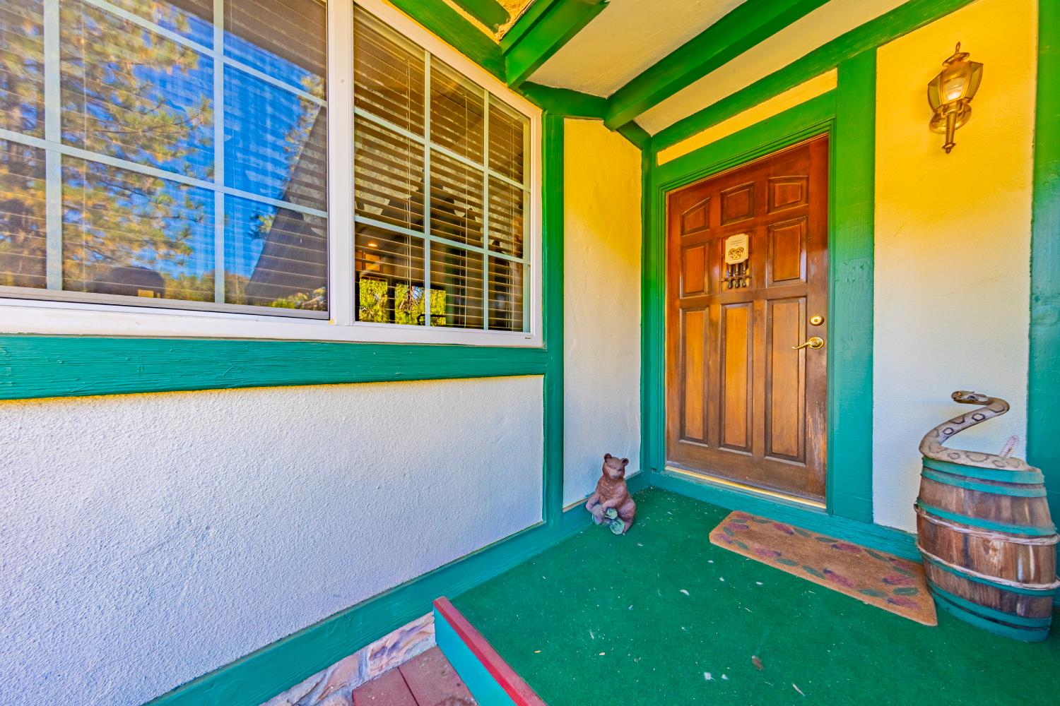 42585 Buckeye Road Oakhurst, CA 93644 - Photo 40 of 55 a front view of a house with a yard