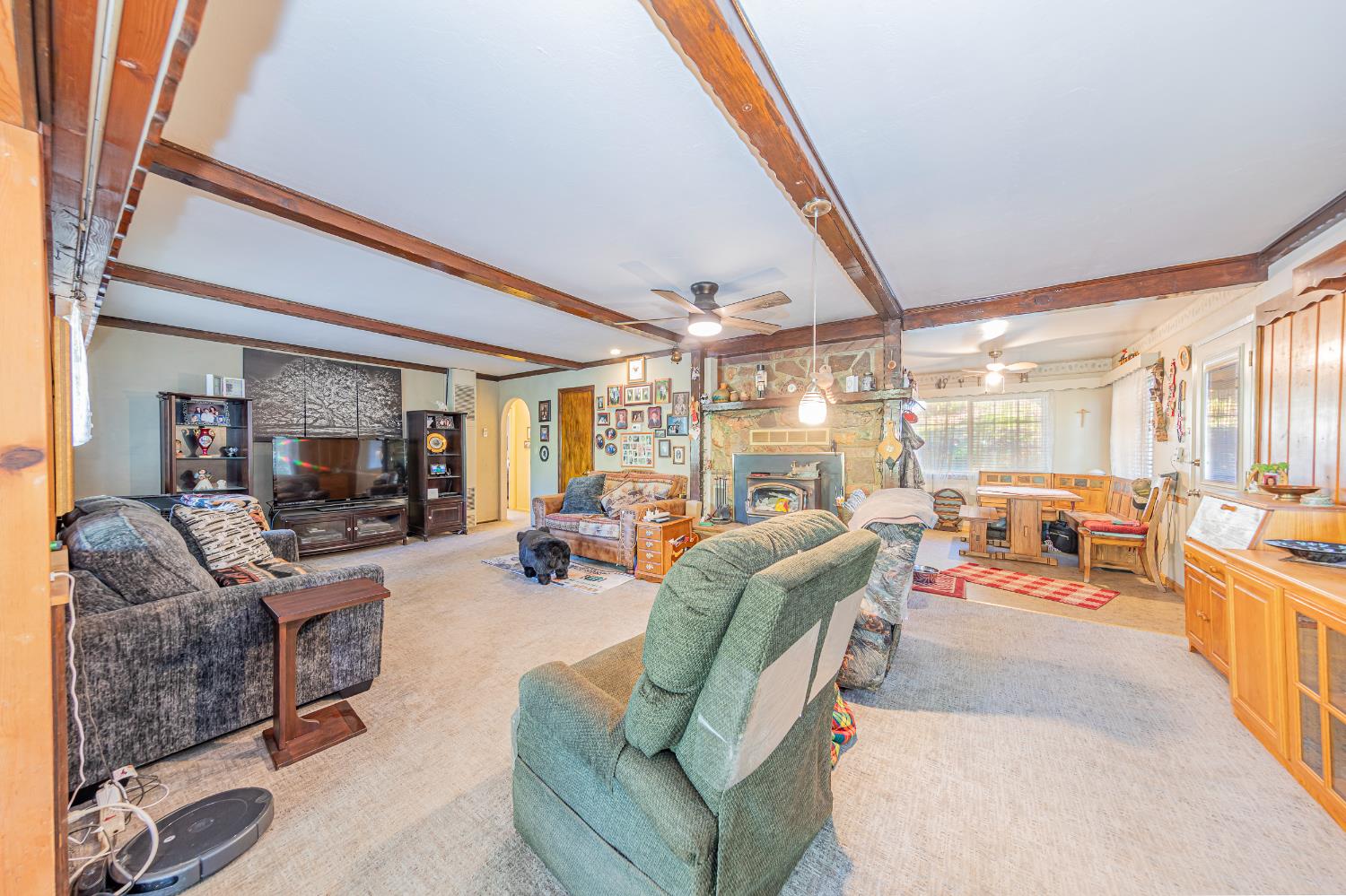 42585 Buckeye Road Oakhurst, CA 93644 - Photo 4 of 55 a living room with furniture and a large window