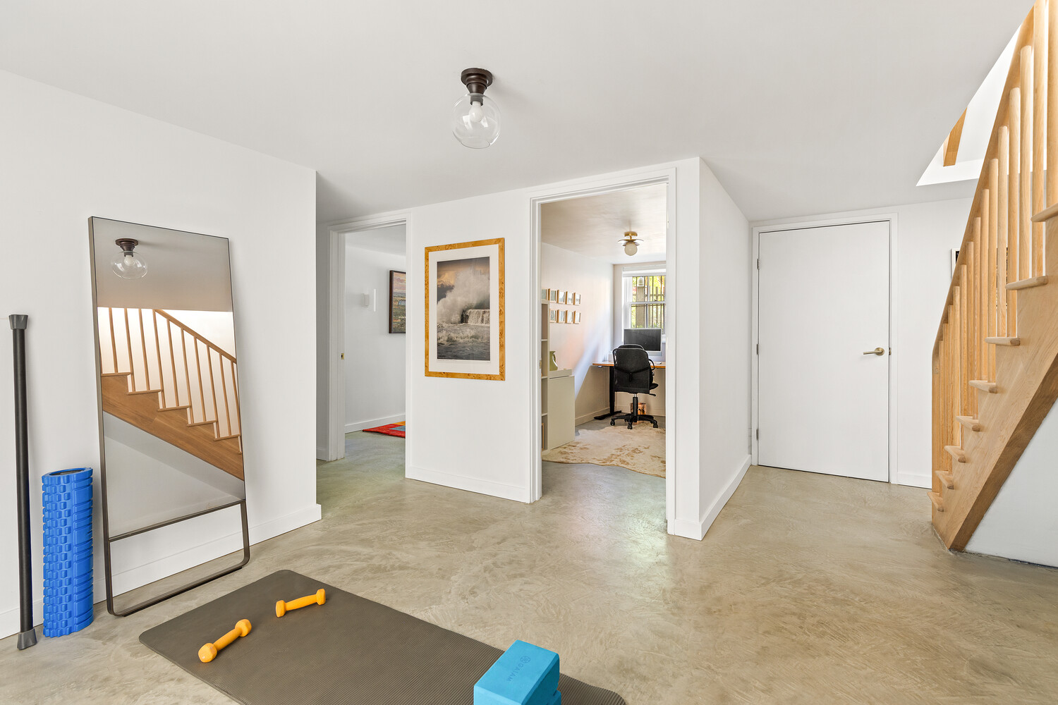 24 Middagh Street Brooklyn, NY 11201 - Photo 24 of 34 a view of a livingroom with wooden floor and a flat screen tv