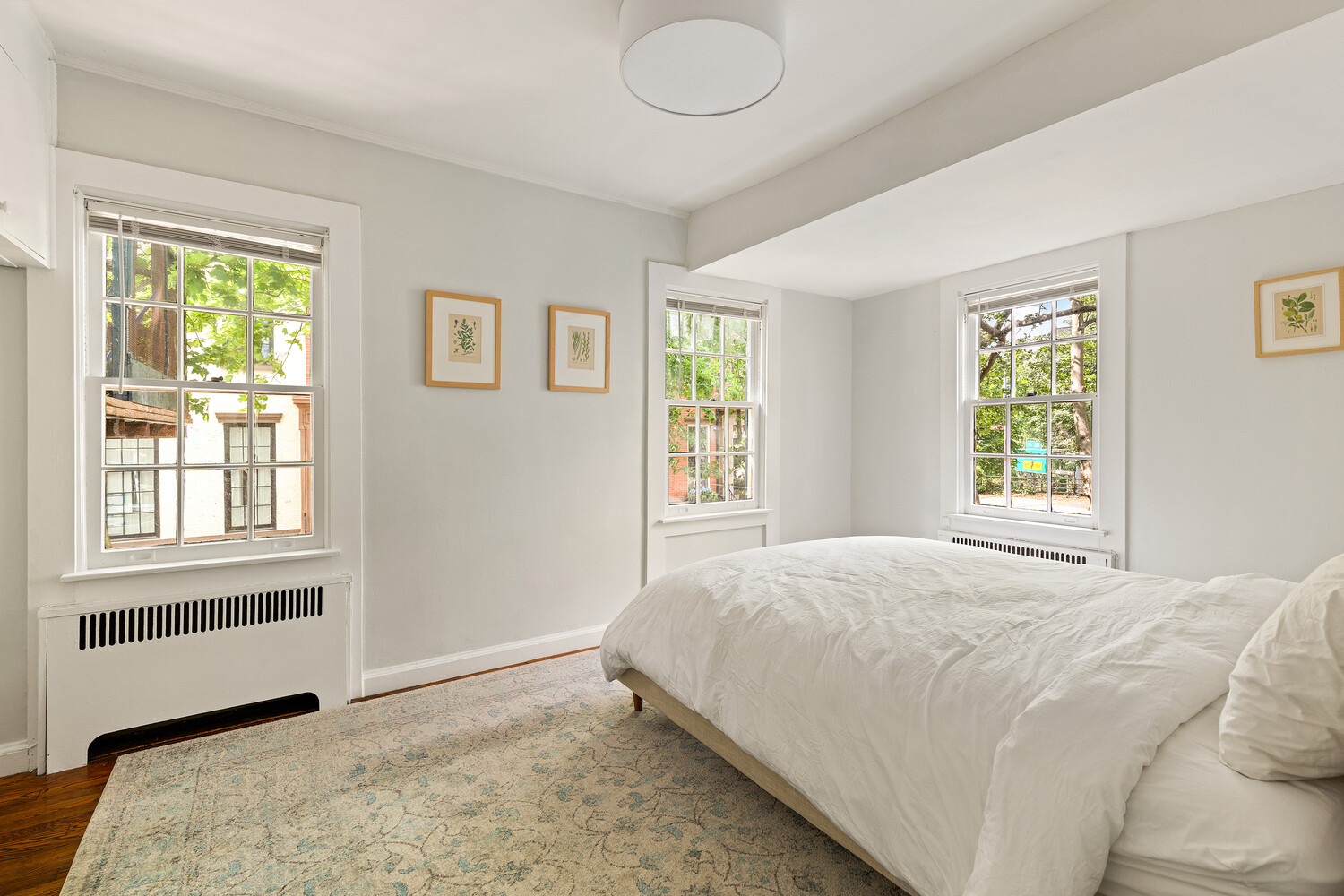 24 Middagh Street Brooklyn, NY 11201 - Photo 29 of 34 a bedroom with a bed and a window