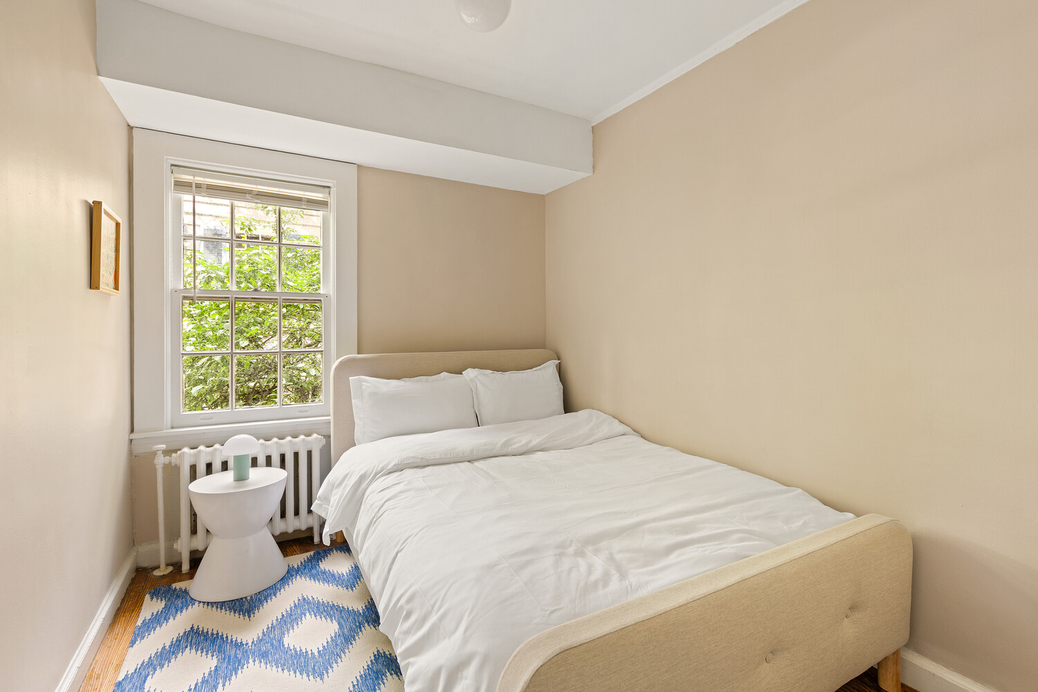 24 Middagh Street Brooklyn, NY 11201 - Photo 31 of 34 a bedroom with a bed and a window