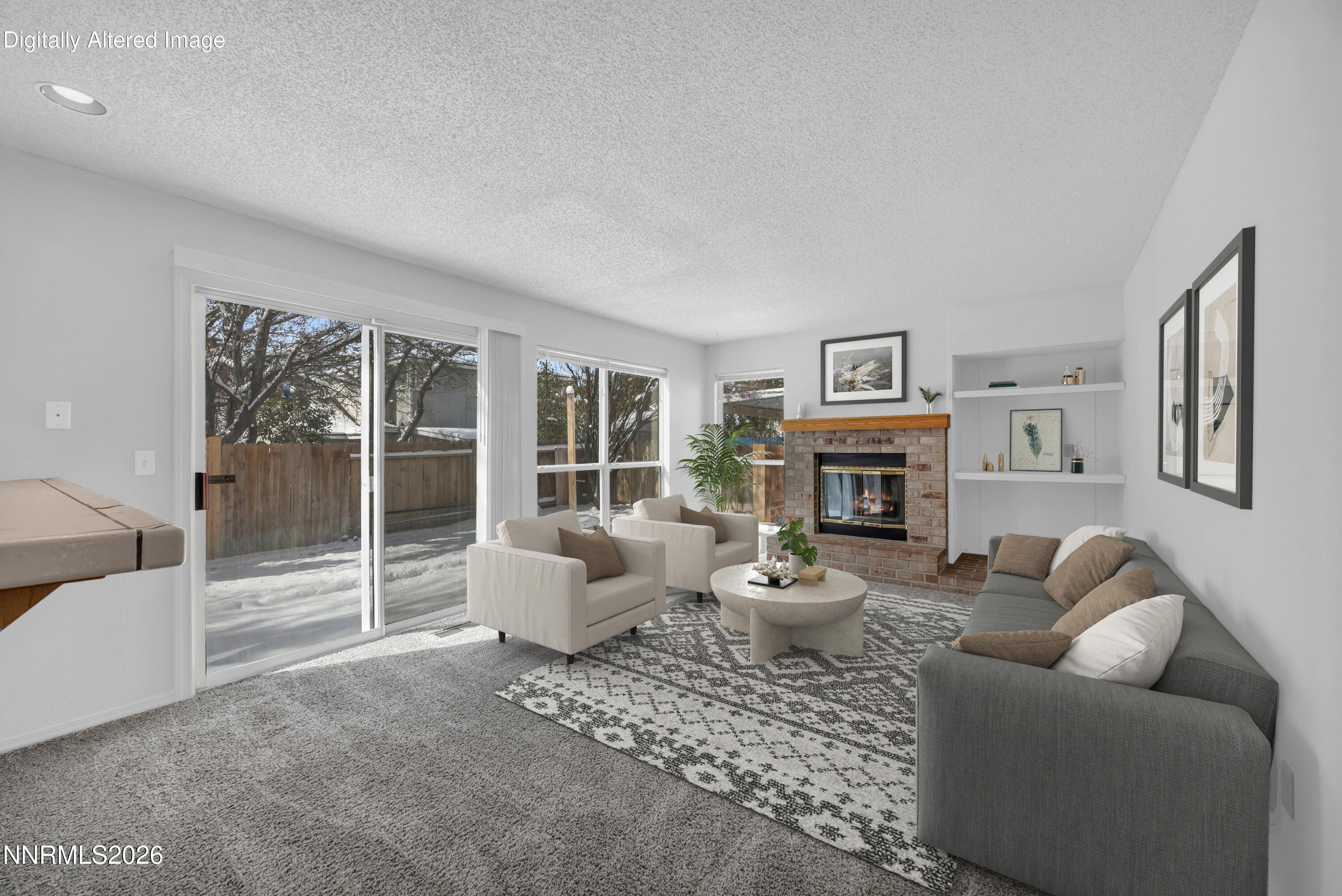 4628 Windcrest Drive Reno, NV 89523 - Photo 15 of 38 a living room with furniture a large window and a fireplace