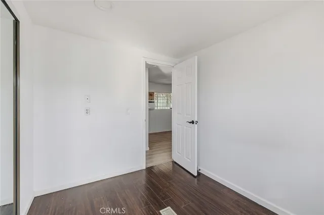 a bathroom with a light fixture and a sink