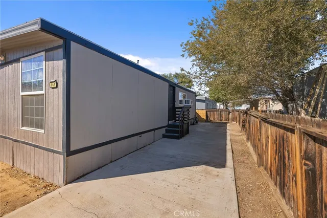 a view of street from balcony