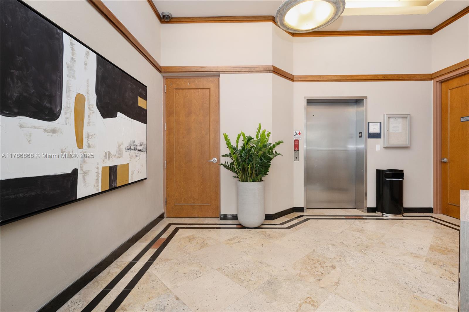 3333 Rice Street, Unit 202 Miami, FL 33133 - Photo 30 of 36 a view of an entryway