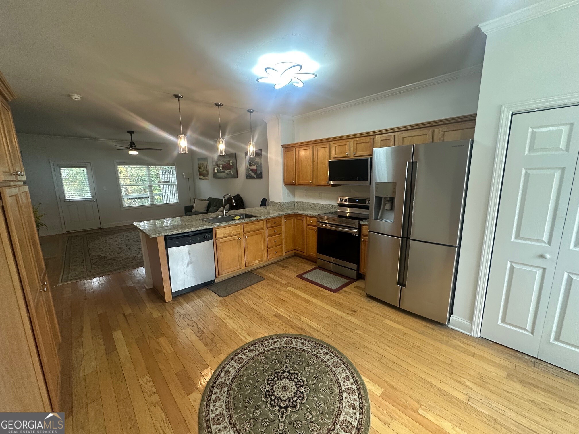 3060 Lauren Parc Road Decatur, GA 30032 - Photo 18 of 34 a kitchen with stainless steel appliances granite countertop a refrigerator sink and stove