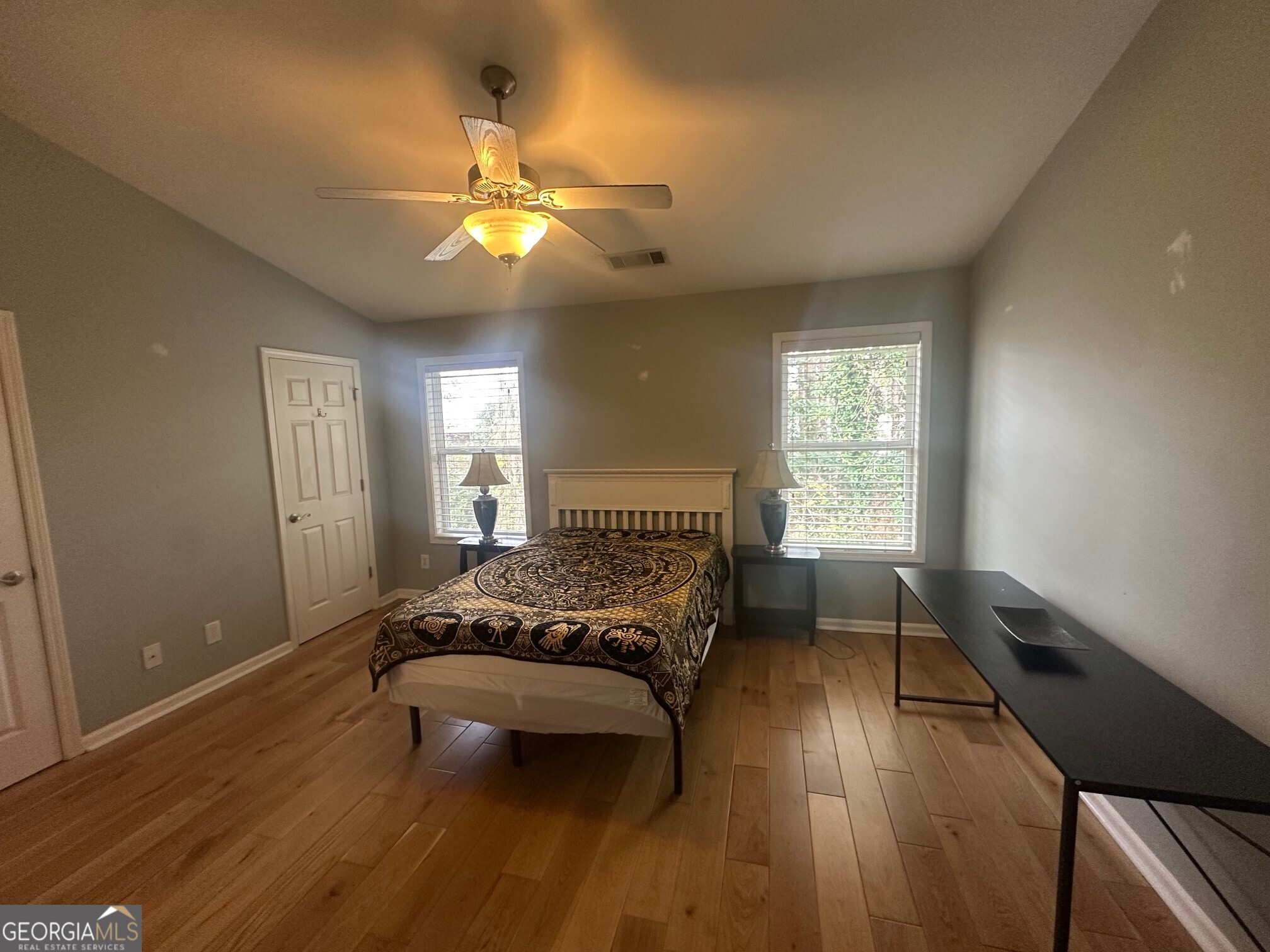 3060 Lauren Parc Road Decatur, GA 30032 - Photo 31 of 34 a bedroom with a bed window and a chandelier