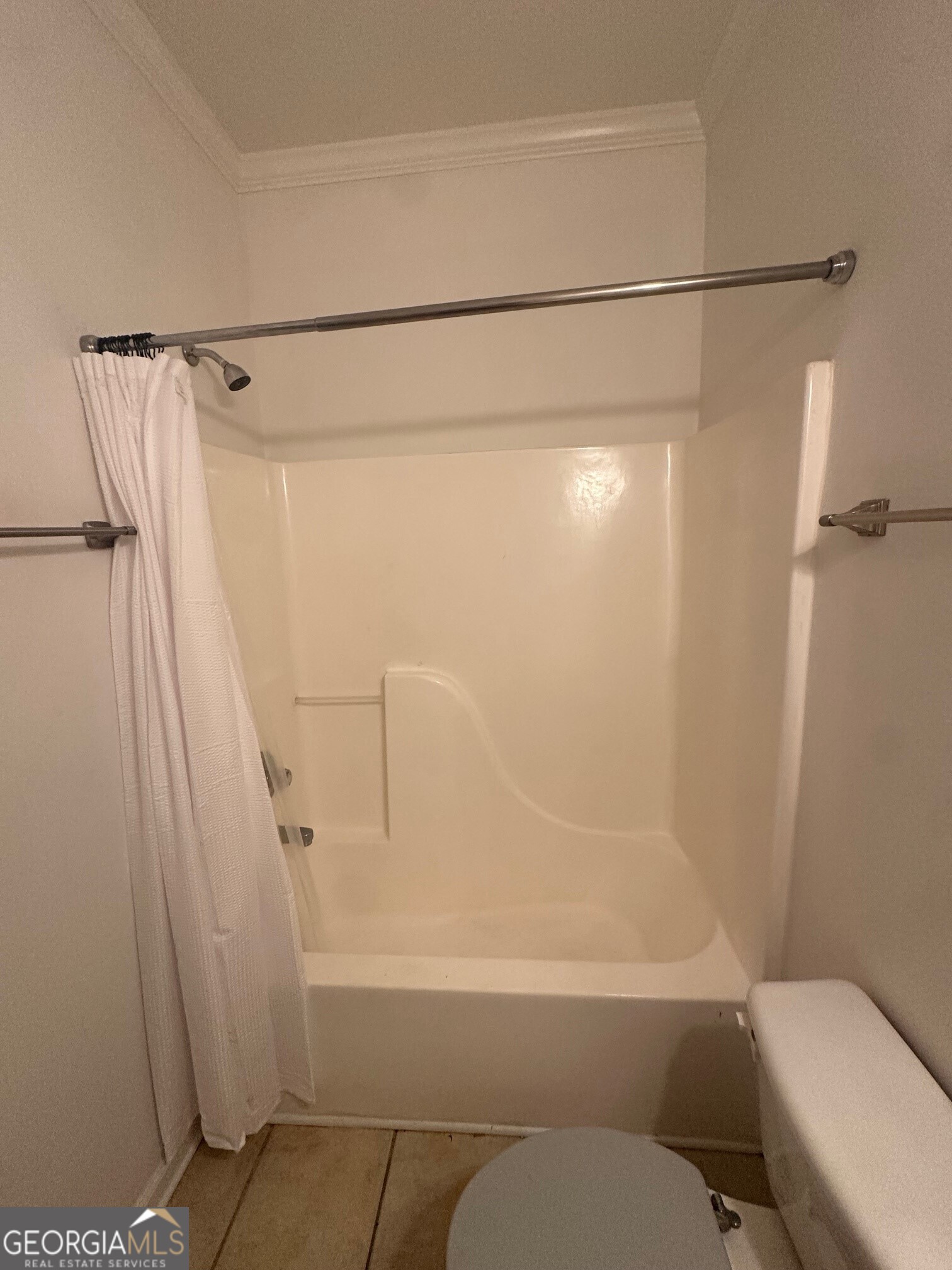 3060 Lauren Parc Road Decatur, GA 30032 - Photo 9 of 34 a bathroom with a shower and a toilet