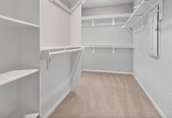 a view of an empty walk in closet