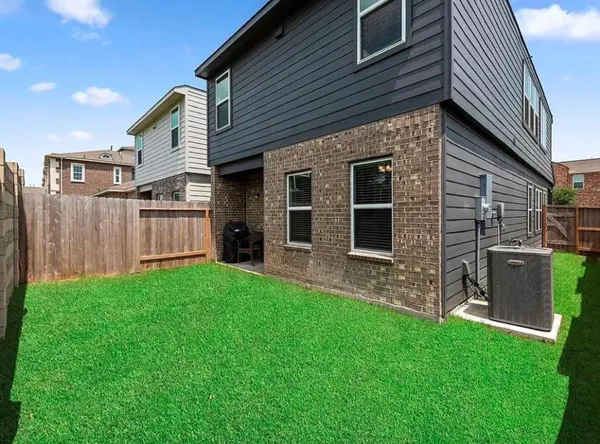 a view of a house with a garden