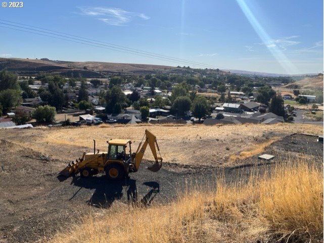 0 Northeast School Drive, Unit 15 Pendleton, OR 97801 - Photo 6 of 16 a view of a lake with a car parked
