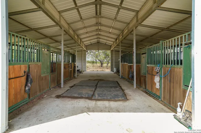 a view of a yard with an outdoor space