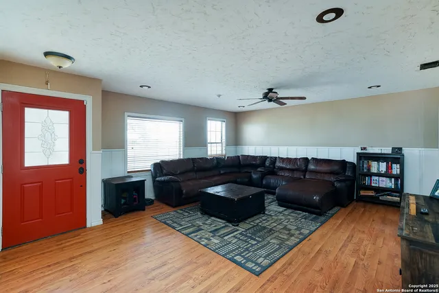 a living room with furniture and a couch