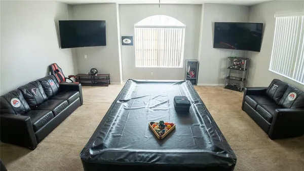 a living room with furniture and a couch