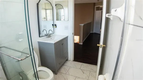 a en suite bathroom with a sink